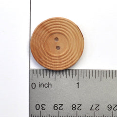 Button with ruler