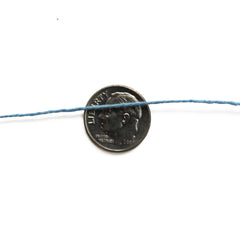 Cotton 10/2 slu-spun weaving yarn on a tube - thread view