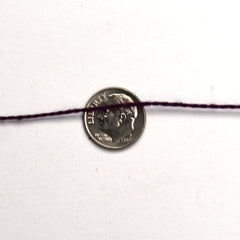Uki Supreme 5/2 Astra cotton yarn cone - thread view