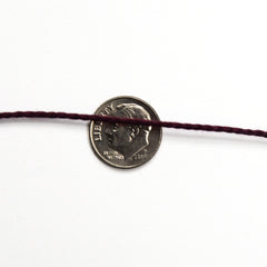Uki Supreme 3/2 cotton yarn on cone - thread view