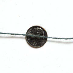 Scottish wool weaving yarn on tubes - thread view