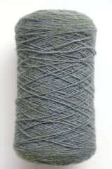 Scottish wool weaving yarn on tubes - side view