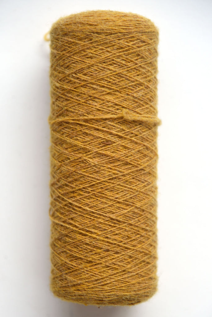 Scottish wool weaving yarn on tubes - side view