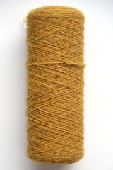Scottish wool weaving yarn on tubes - side view