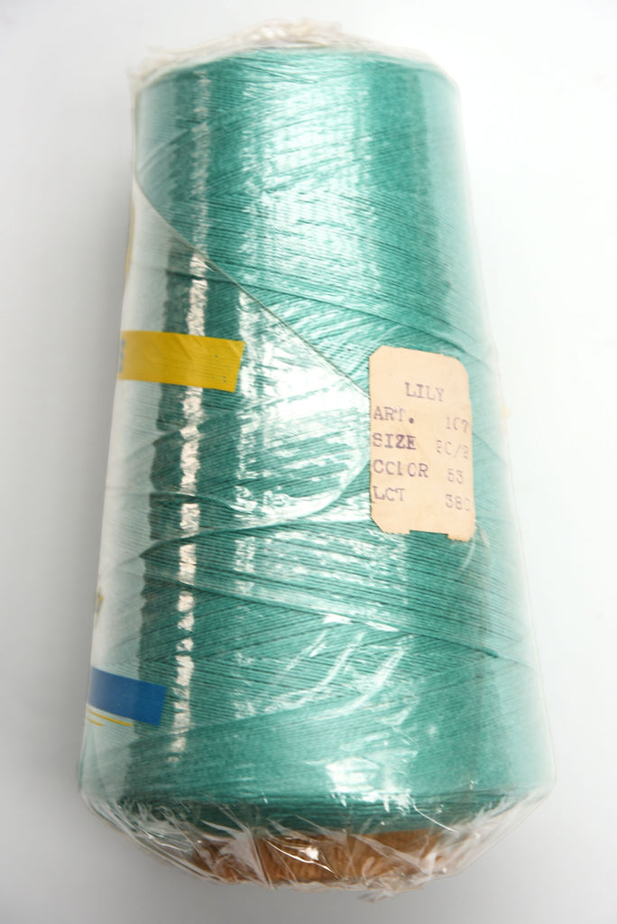 Lily 20/2 cotton yarn on a cone, wrapped in plastic - side view