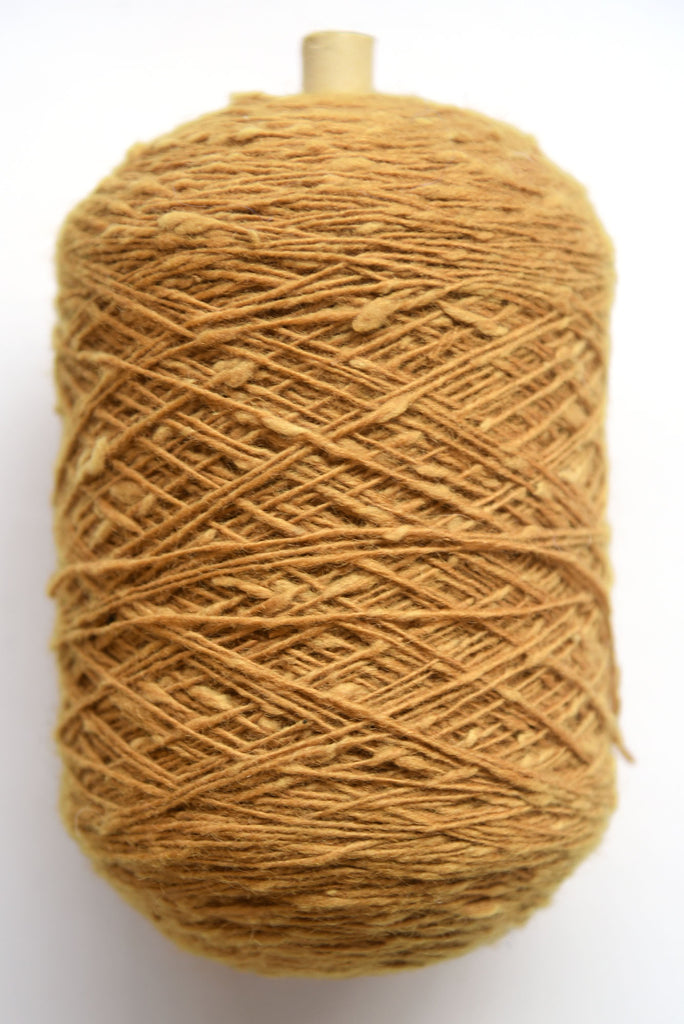 Scottish wool weaving yarn on tubes - side view