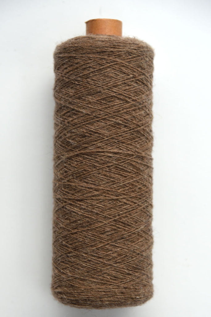 Scottish wool weaving yarn on tubes - side view