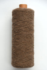 Scottish wool weaving yarn on tubes - side view