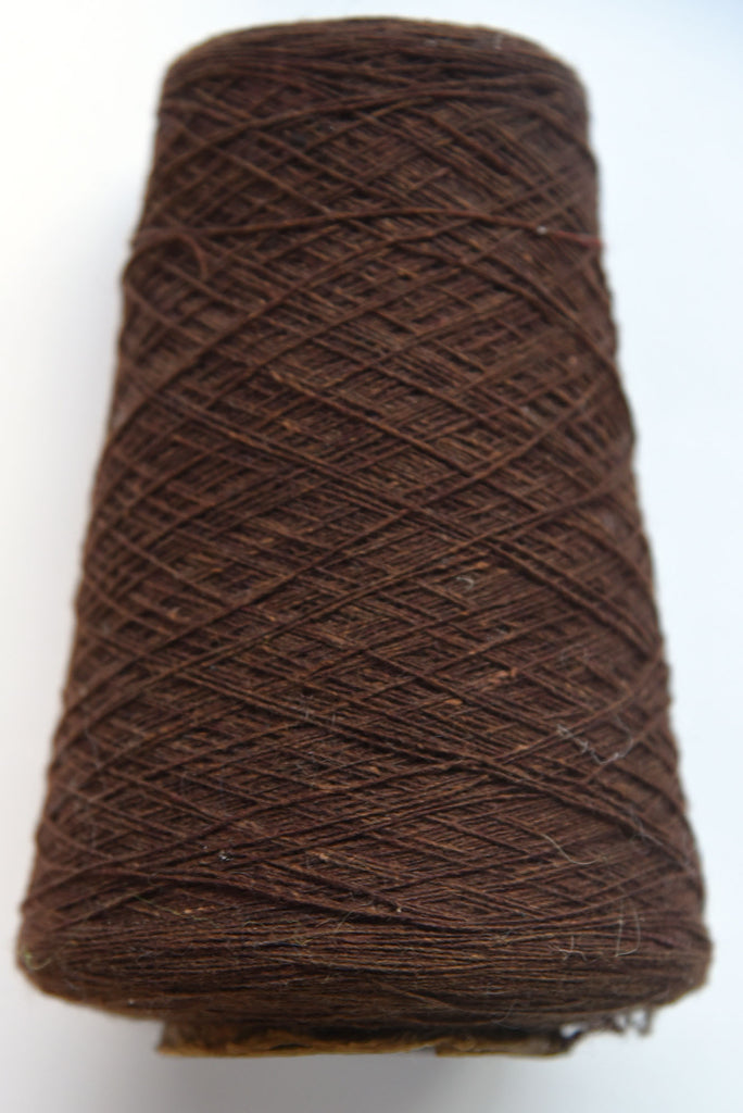 Vintage Scottish wool weaving yarn on a cone - side view