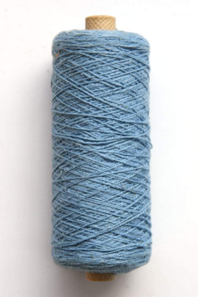 Cotton 10/2 slu-spun weaving yarn on a tube - side view